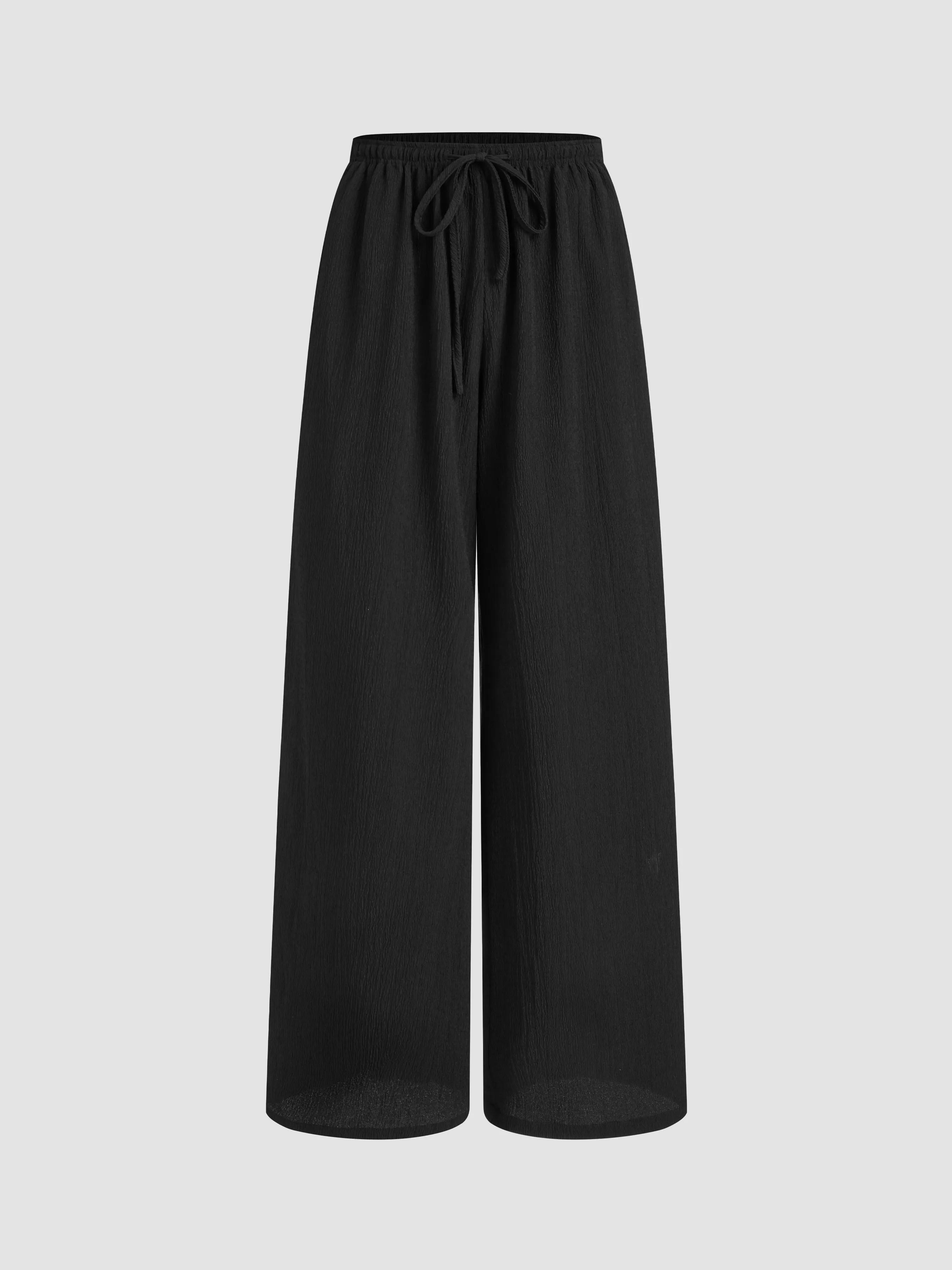 Pantalon droit noué à taille mi-haute uni