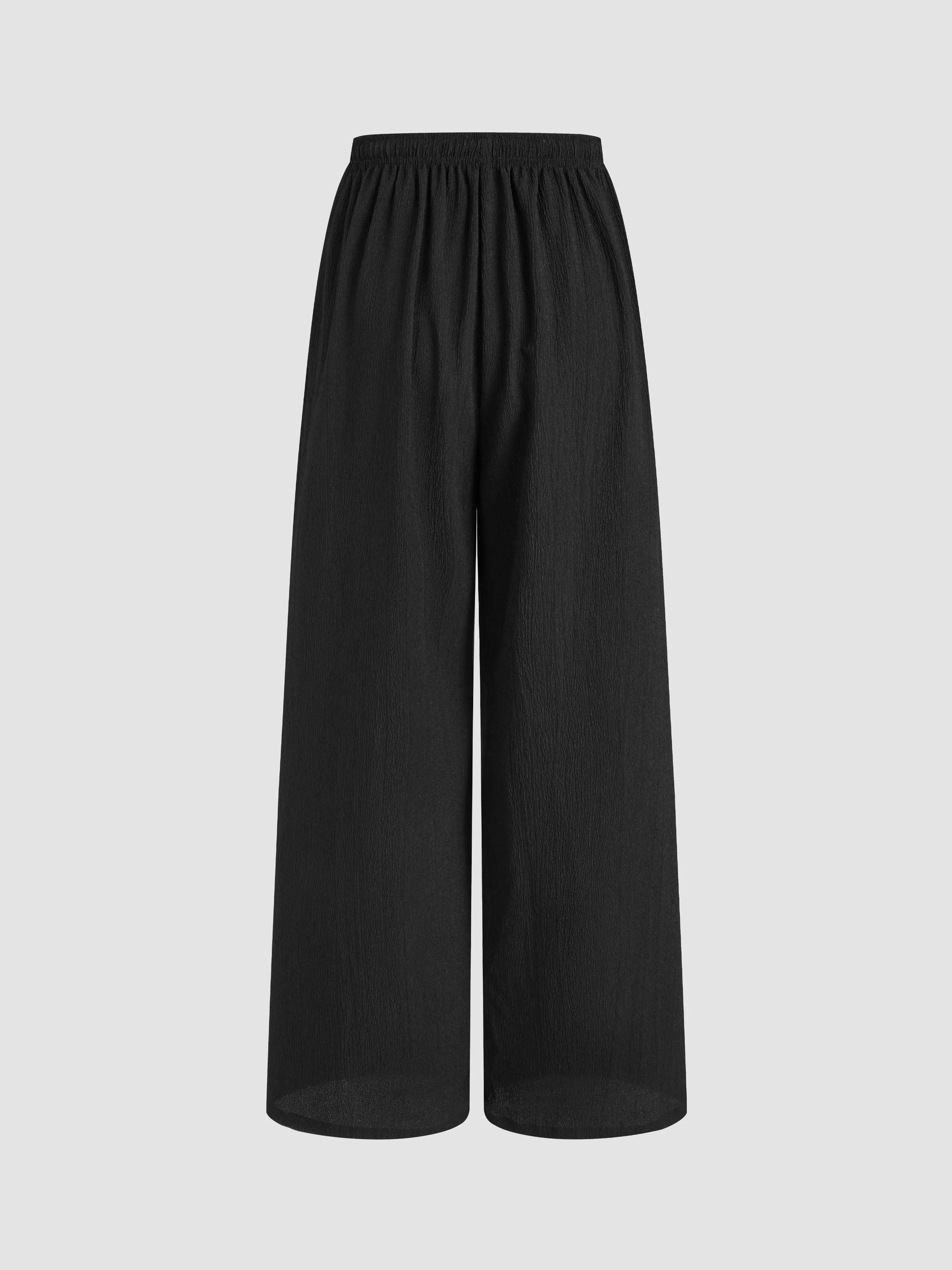 Pantalon droit noué à taille mi-haute uni